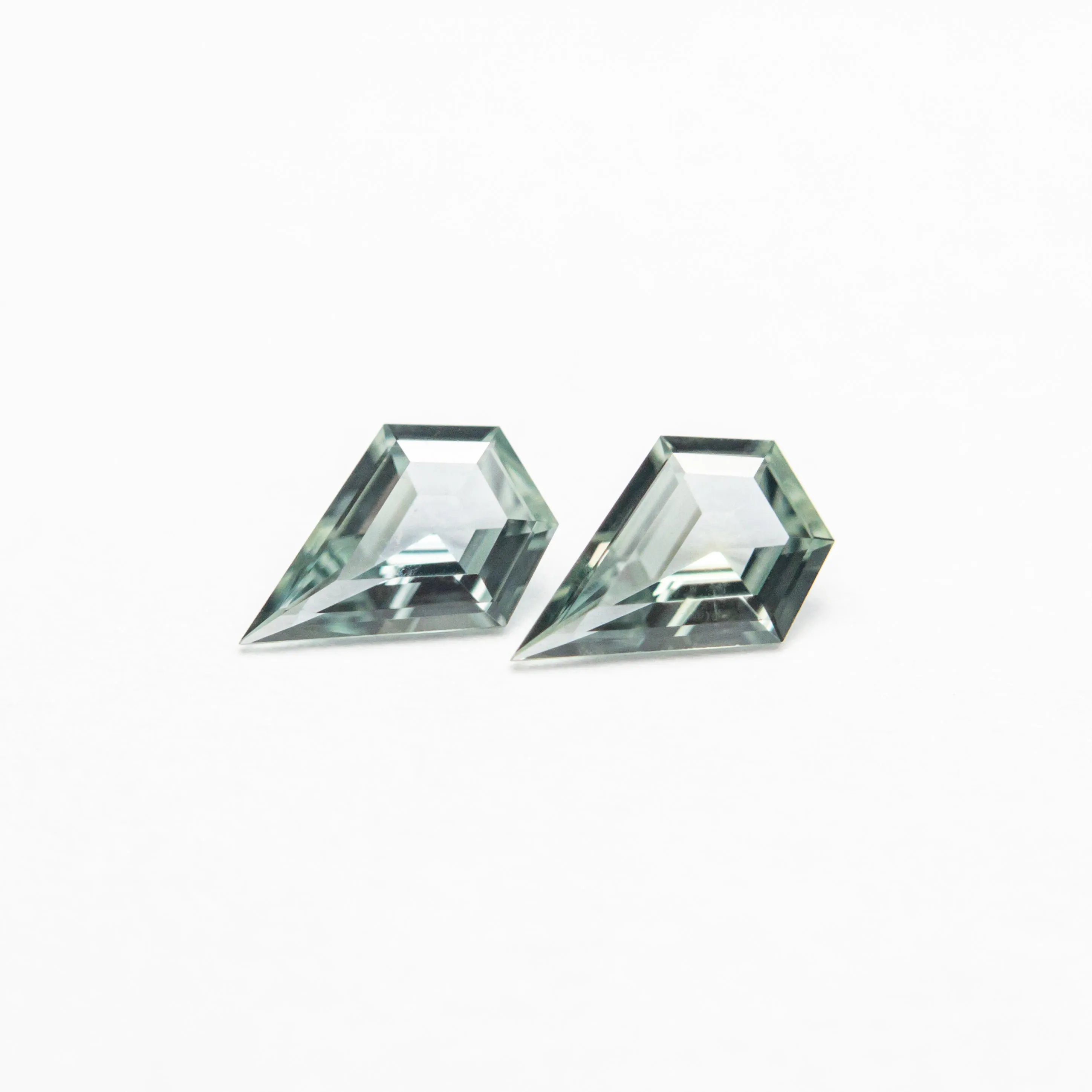 0.31cttw 2pc 5.00x3.43x1.51mm 4.92x3.47x1.55mm Shield Step Cut Sapphire Matching Pair 23402-01