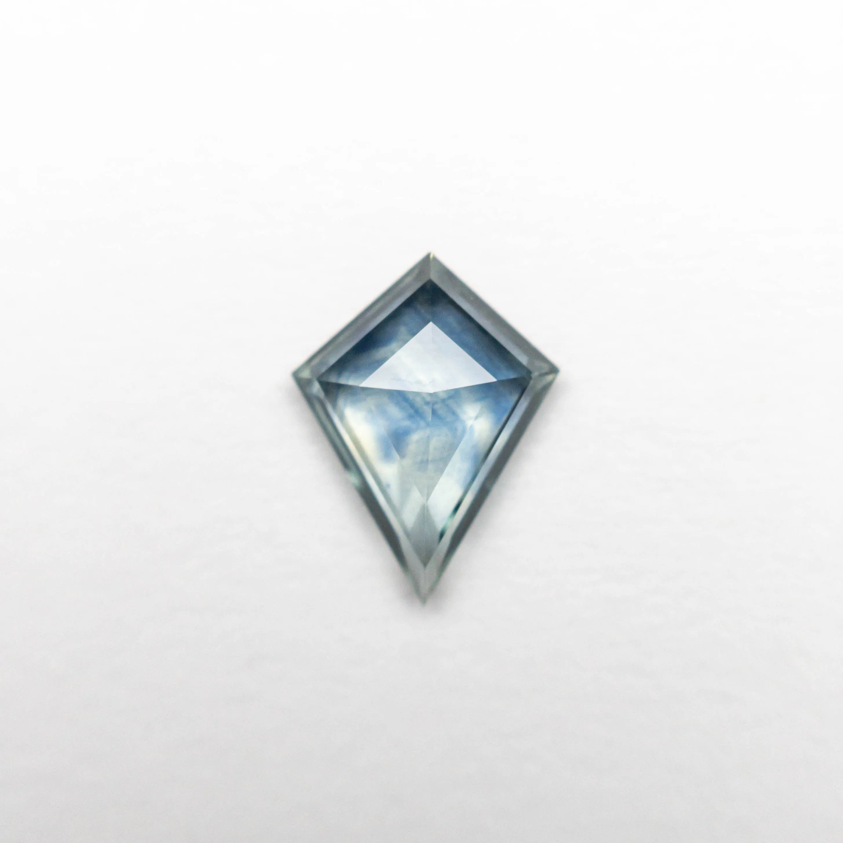 0.60ct 7.77x5.91x2.16mm Kite Step Cut Sapphire 22266-10